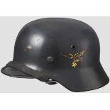 A steel helmet M 35, Luftwaffe, DD 85 % smooth blue-grey paint, 90 % decals, national emblem