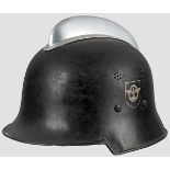 A lightweight steel helmet M 34, fire police, DD and comb 95 % black paint and decals, aluminium