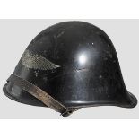 A Dutch steel helmet M 23/27, reissued to Luftschutz 80 % smooth black paint, 85 % of national