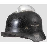 A steel helmet M 35, Luftwaffe, SD, modified fire brigade 70 % black paint over blue-grey, 40 %