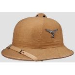 A tropical pith helmet, Luftwaffe Tan canvas covered intact cork body, brown leather trim and strap,