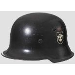 A lightweight steel helmet M 34, police, DD 90 % smooth black paint, 95 % decals, maker's mark in