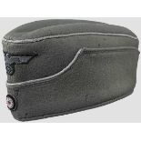 A garrison cap for officers of the army Field-grey doe skin wool body, silver bullion piping,