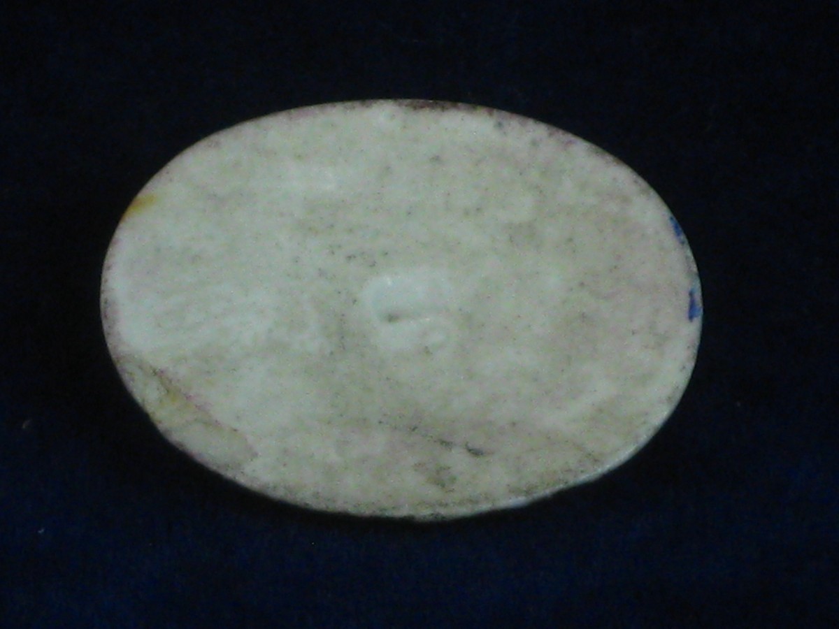 C19th CERAMIC PAINTING . A well painted C19th or earlier oval, domed ceramic painted plaque - Image 3 of 3