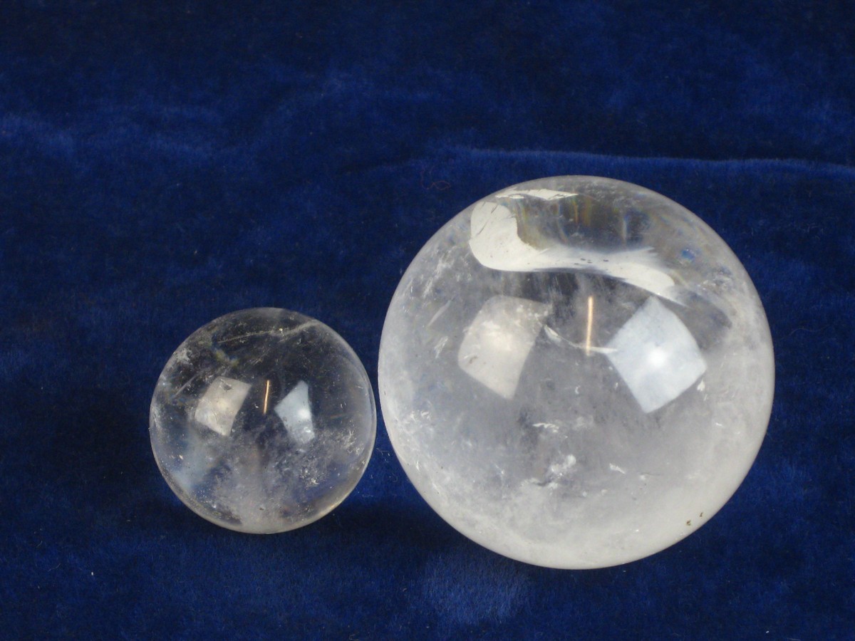 POLISHED QUARTZ SPHERES.  A pair of polished quartz spheres; the larger with a diameter of @ 2 ¼ - Image 2 of 3