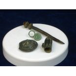 4 x CELTIC BRONZE ITEMS.   A large bronze cloak pin 3 ½ inches in length, a disc form clothes
