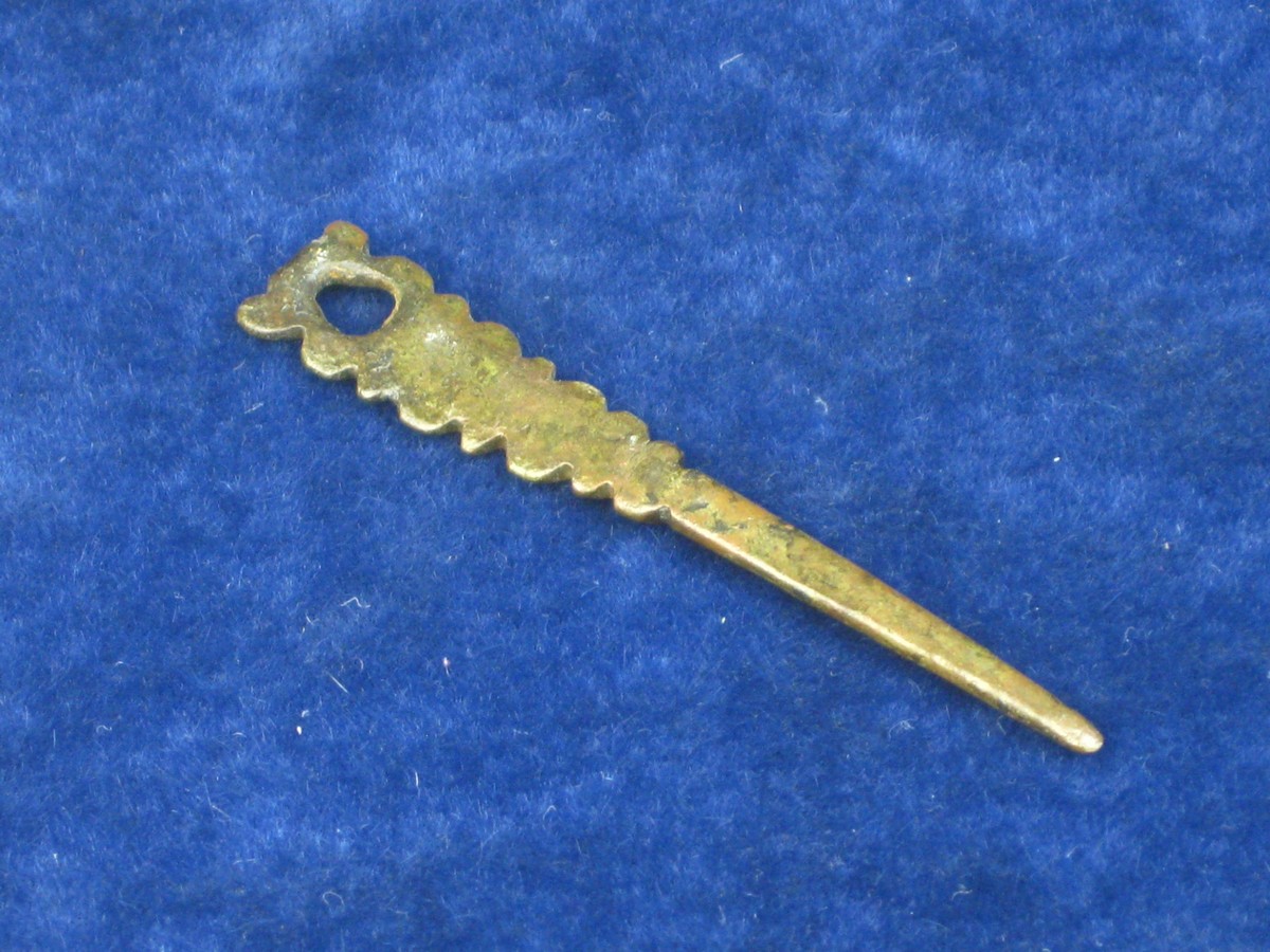 ROMAN NAIL CLEANER. A bronze nail cleaner2 ¾ inches long stated to have been found near Cirencester.