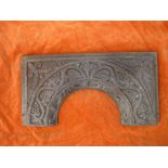 C16th ENGLISH CARVED OAK ARCHED PANEL.  A late C16th elaborately carved oak panel measuring 16 ½ x 8