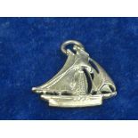 SILVER SHIP PENDANT. A high quality pendant or charm in the form of a Bermuda Sloop trading vessel