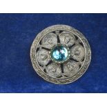 DECORATIVE BROOCH WITH STONE C16/17th. A large and impressive cast pewter brooch decorated with