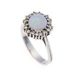 Opal-Brillant-Ring WG 750/000 mit einem Milchopalcabochon 8 mm und Brillanten, zus. 0,28 ct W/SI, RG