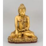 Buddha, Siam 1. H. 20. Jh., vollplastische Holzschnitzerei mit Paillettenbesatz undRestvergoldung,