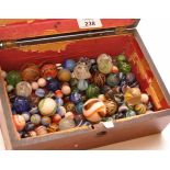 A COLLECTION OF VINTAGE GLASS MARBLES OF