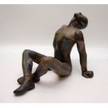 A CONTEMPORARY ART POTTERY FIGURE OF A S