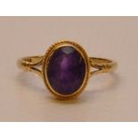 A 9CT GOLD AMETHYST RING