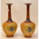 A PAIR OF DOULTON ONION SHAPED VASES INI