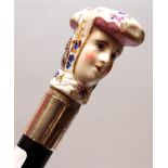 WALKING STICK TOPPED WITH A CERAMIC LADY