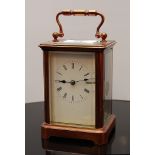 A FIVE GLASS BRASS CARRIAGE CLOCK WITH K