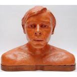 A CONTEMPORARY PAINTED POTTERY BUST OF A