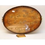 AN OVAL MAHOGANY TRAY INLAID WITH DOMINO