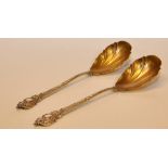 A PAIR OF SILVER FRUIT SERVING SPOONS WI