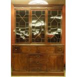 AN EARLY C19TH MAHOGANY BOOKCASE WITH TR