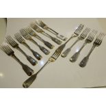 12 LARGE SILVER EARLY C19TH DINNER FORKS