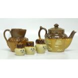 A SET OF 3 GRADUATED MINIATURE STONEWARE