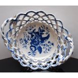 A LOWESTOFT BLUE AND WHITE BASKET, THE I