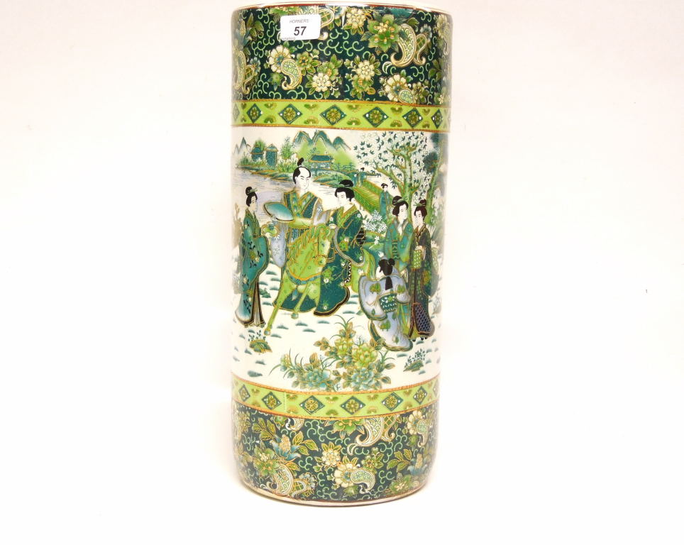 A CYLINDRICAL ORIENTAL CHINA STICK STAND