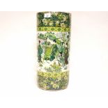 A CYLINDRICAL ORIENTAL CHINA STICK STAND