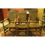 A SET OF FOUR REPRODUCTION OAK ARMCHAIRS