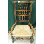 A NORTH COUNTRY OAK LOW CARVER CHAIR WIT