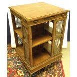 EARLY C20TH OAK REVOLVING BOOKCASE WITH