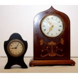 AN EDWARDIAN MAHOGANY INLAID MANTLE CLOC