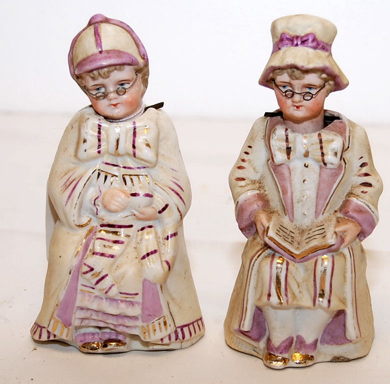 A PAIR OF VICTORIAN POTTERY NODDING GRAN