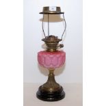 A VICTORIAN BRASS OIL LAMP WITH UNUSUAL