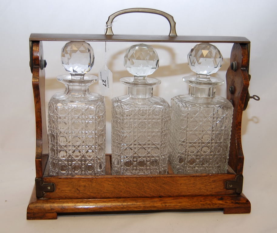 THREE BOTTLE OAK TANTALUS, CIRCA 1900 WI