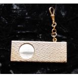 A 9CT. GOLD CIGAR CUTTER