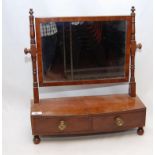 AN EARLY 19TH CENTURY MAHOGANY BOW FRONT