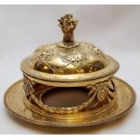 A GILT METAL CIRCULAR DISH AND COVER (LA