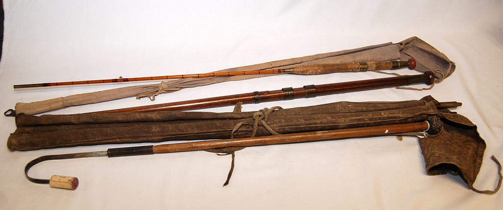 2 VINTAGE CANE FISHING RODS AND A VINTAG