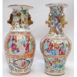 A PAIR OF CANTONESE FAMILLE ROSE VASES,