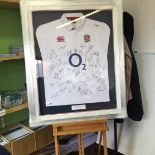 A 2015 ENGLAND WORLD RUGBY SHIRT SIGNED BY ALL 50 OF THE SUMMER SQUAD.