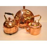 AN ANTIQUE COPPER WARMING PAN WITH TURNED WOODEN HANDLE AND TWO DECORATIVE COPPER VINTAGE KETTLES