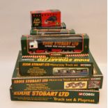 THREE BOXED "EDDIE STOBART" MOTORWAY TRUCK SETS (TWO WITH PLAY MATS) THREE ROAD HAULAGE EDDIE