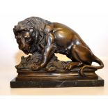 A BRONZE LION  - HEIGHT 23cm.