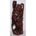 CARVED HARDWOOD FIGURE OF CHINESE MAN WITH DOG