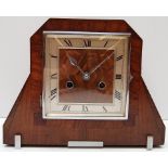 WALNUT CASED MANTEL CLOCK IN DECO PERIOD STYLE.