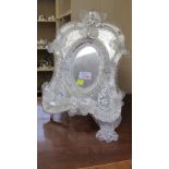 A Venetian glass, flower encrusted easel mirror